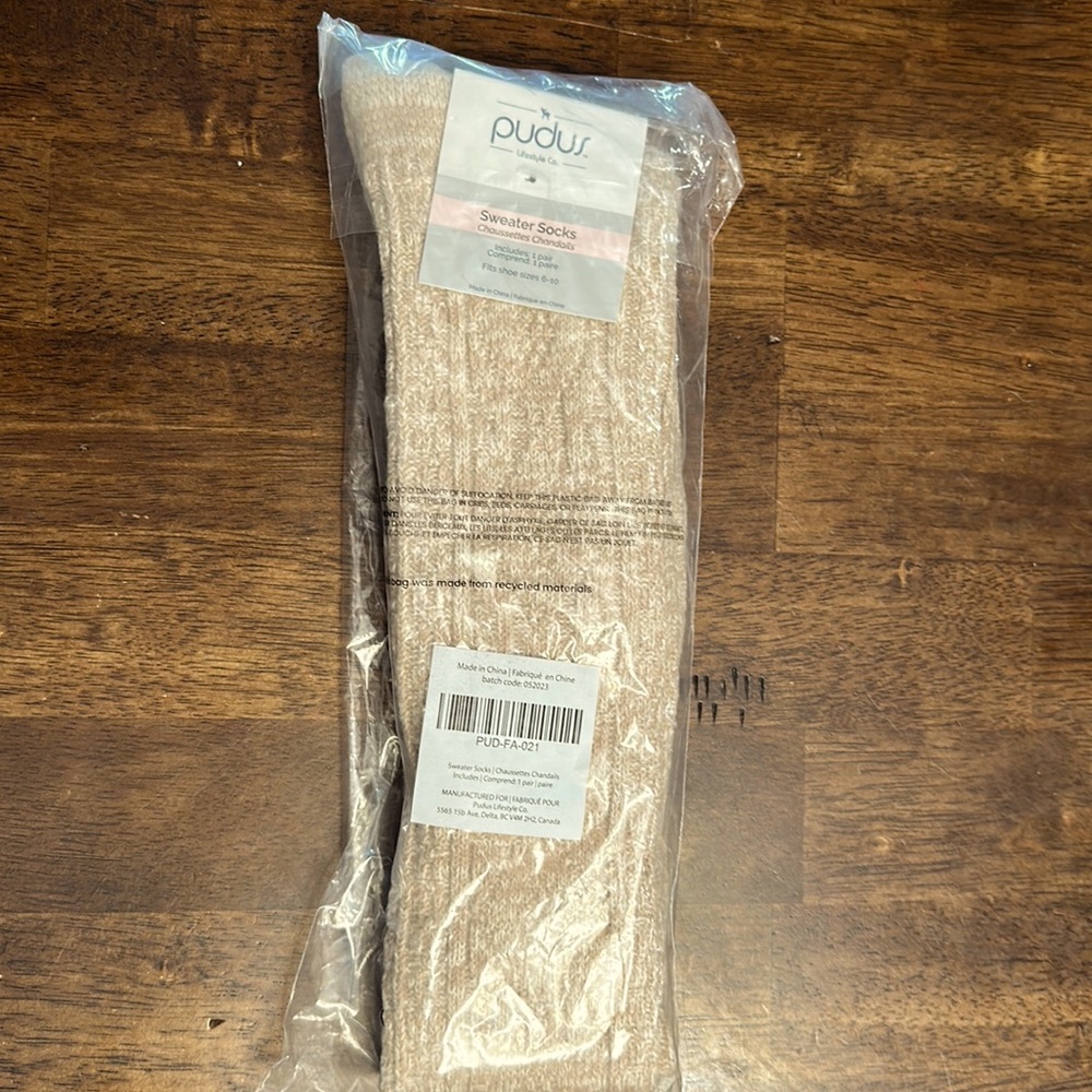 Brand new Pudus Sweater Socks. Fits shoe size 6-10.